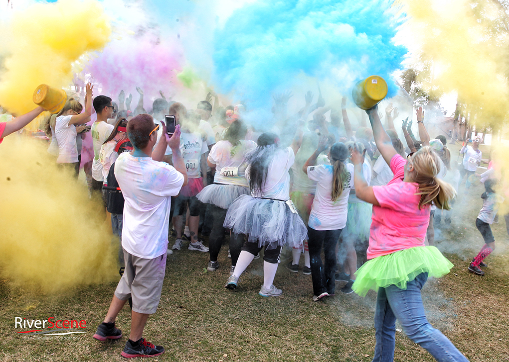 Runners participate in a color bomb after the race Saturday morning  Jillian Danielson/RiverScene 