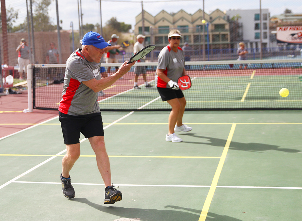 Frank Thompson and Wendy Holloway compete in a Pickleball Tournament Saturday afternoon. Jillian Danielson/RiverScene 