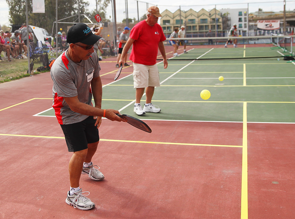 Terry Cameron and Roger Will play Pickleball Saturday afternoon in a tournament. Jillian Danielson/RiverScene 