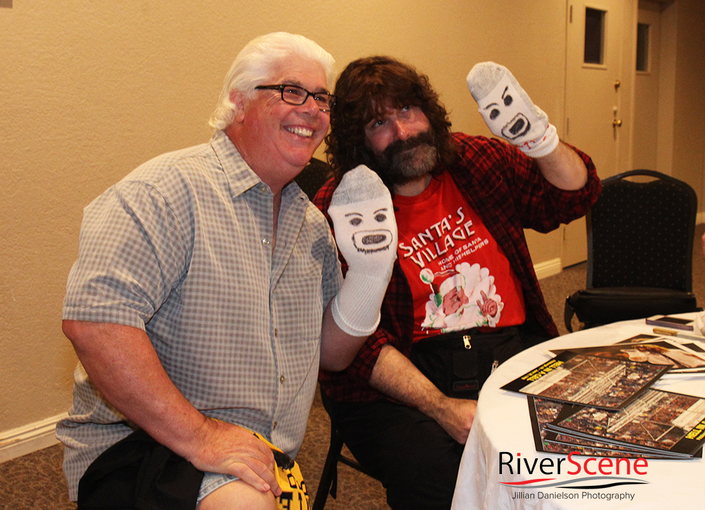 A fan gets his photo with Mick Foley Saturday evening. 
