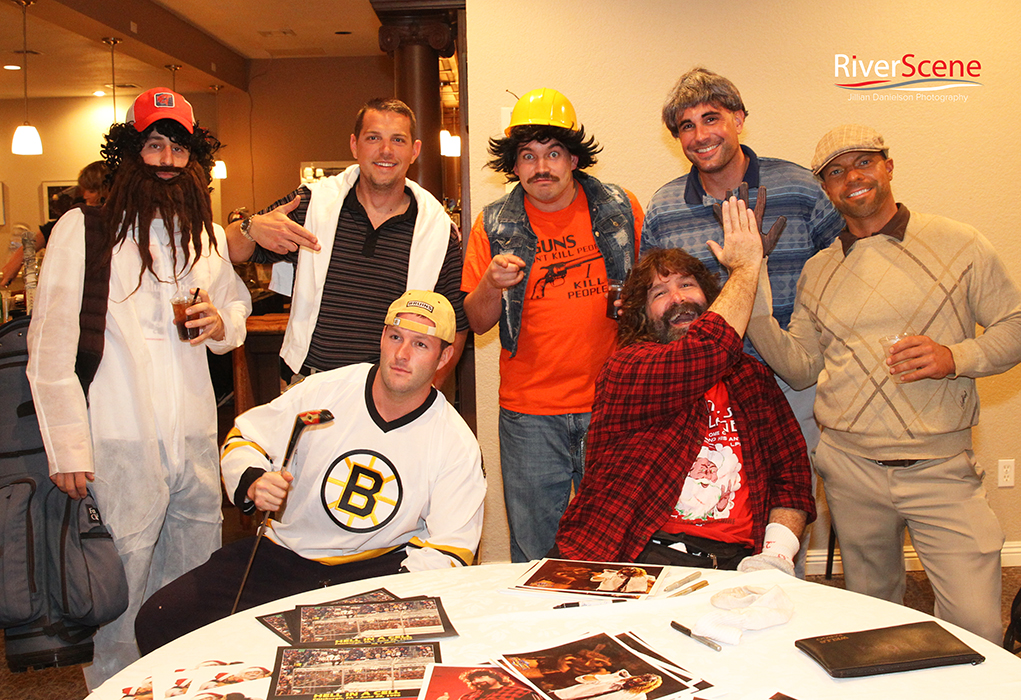 A group dressed as the characters from "Happy Gilmore" pose with Mick Foley Saturday evening at the London Bridge Resort. The group was celebrating Patrick Larson's birthday. 