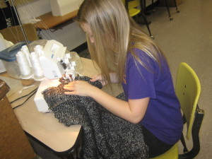 Student in Strothers Fashion Design Class works on an outfit for competition. /Submitted photo