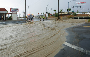 A parking lot fills with water during a storm on July 13, 2012. Jillian Danielson/RiverScene 