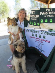  Barbara Schoof, president and program coordinator of Pet Partners of Havasu, poses with her two therapy dogs, Eva and Wally, at Jack Hardie Park Saturday in Lake Havasu City. Jayne Hanson/RiverScene 