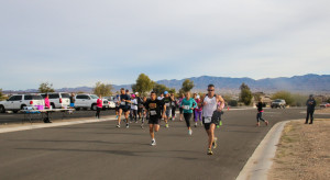 Participants from Sandie's Pass 5K take off from the start line Saturday morning. Rick Powell/RiverScene 