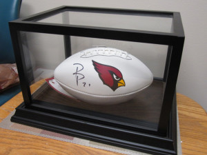 Sasseen's signed football sits in her office.Judy Lacey/RiverScene
