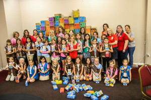Girl Scout and Brownie troops pose with the Lake Havasu Military Moms Wednesday evening. Rick Powell/RiverScene 