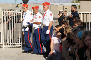 The Marine Corps League Color Guard present the Colors Monday morning. Jillian Danielson/RiverScene 