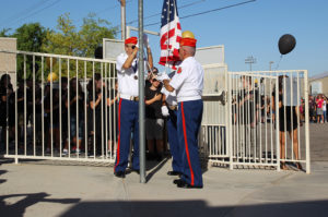 Marine Corps League Color Guard performs a flag raising ceremony Monday morning at Telesis. Jillian Danielson/RiverScene 