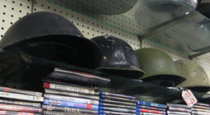 Military helmets sit on display at Best Bet Pawn Shop. Jillian Danielson/RiverScene