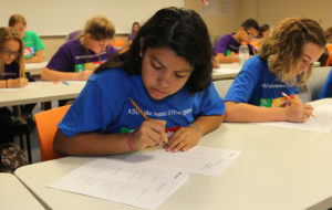 Viviana Solis works on math problems Friday morning at ASU. Jillian Danielson/RiverScene 