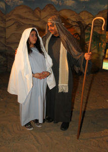 Aliya Smith and Kyle Neidermann pose for a photo as Mary and Joseph in the Live Nativity. Jillian Danielson/RiverScene 