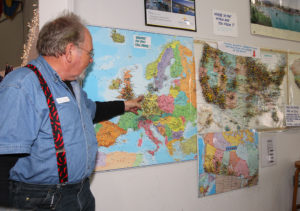 Jan Kassis points to his hometown on the map at the Visitors Center Wednesday. Jillian Danielson/RiverScene 