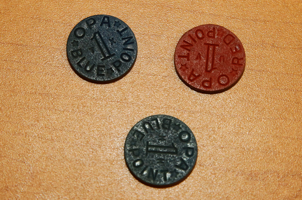 Food tokens kept by Roz from WW2 that were handed out to families by the government. Jillian Danielson/RiverScene 