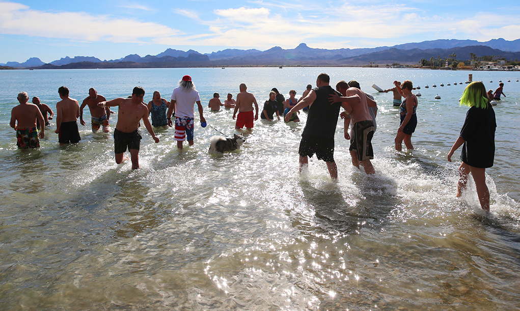 Polar Bear Day Participants Plunge Into Lake Havasu For The Chill Of It