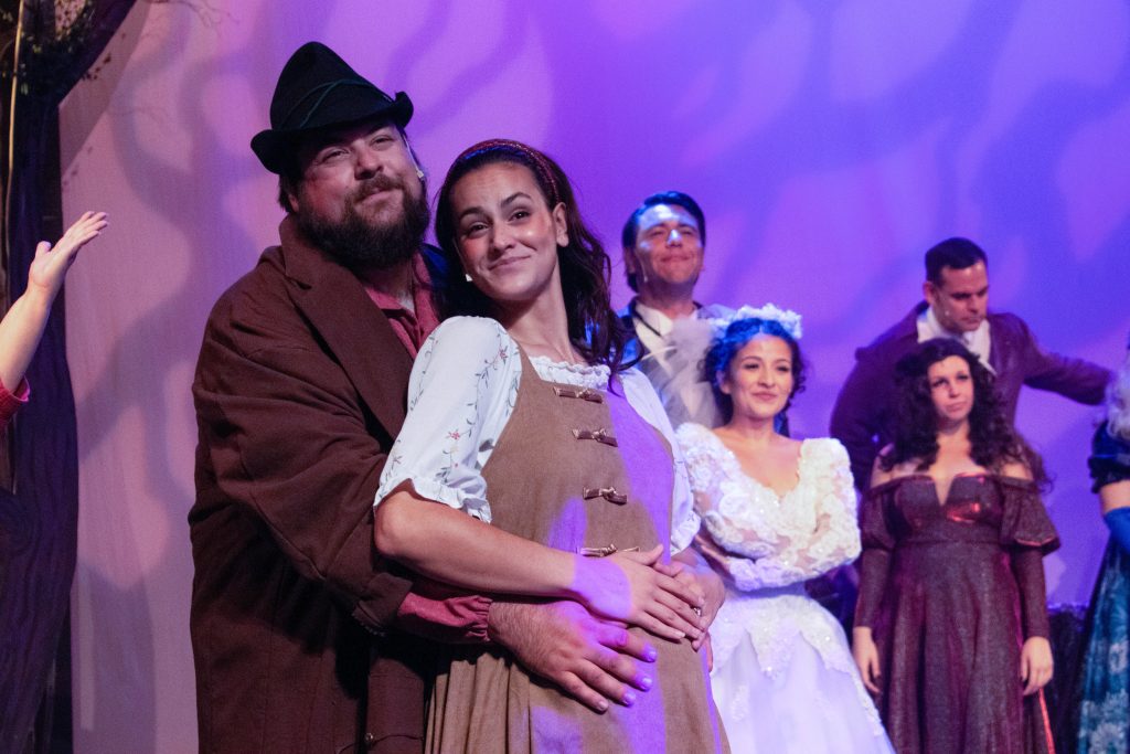 Tyler Fallis as the Baker and Camaro Iseminger as the Baker's Wife (front) in Into the Woods