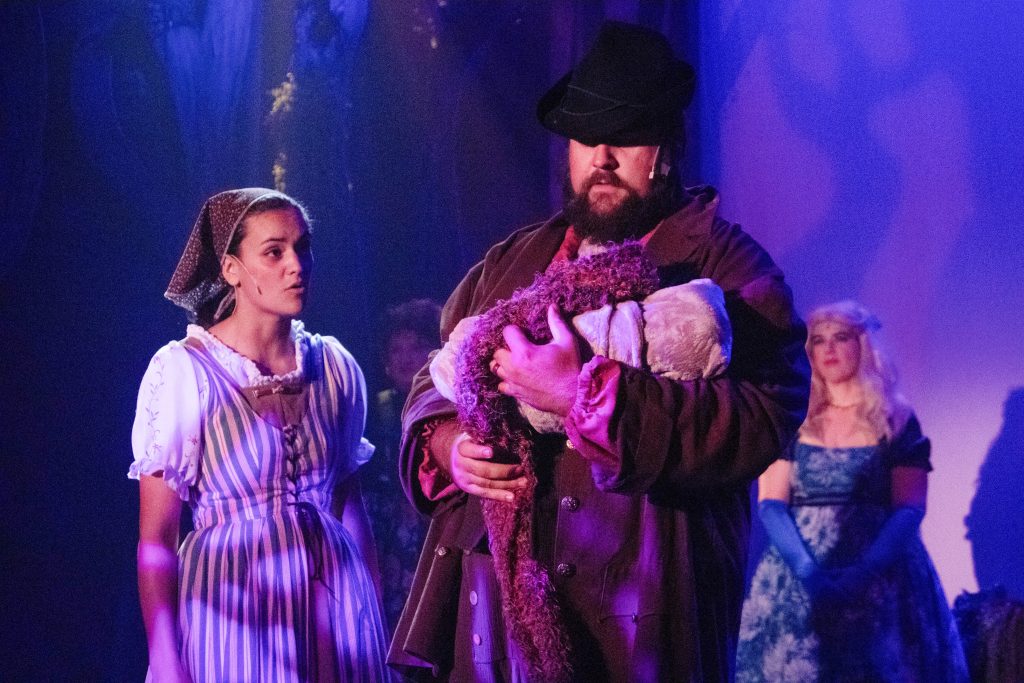 Camaro Iseminger as the Baker's Wife and Tyler Fallis as the Baker (front) in Into the Woods