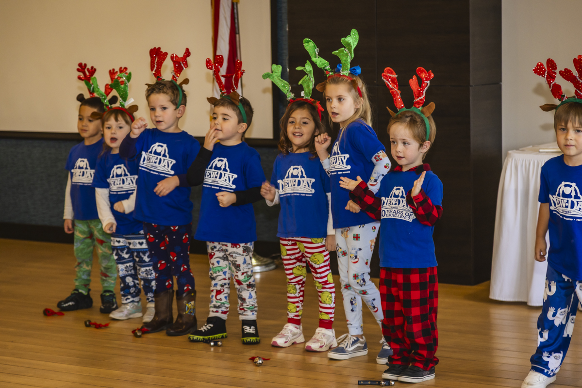 New Day Students Sing for Kiwanis